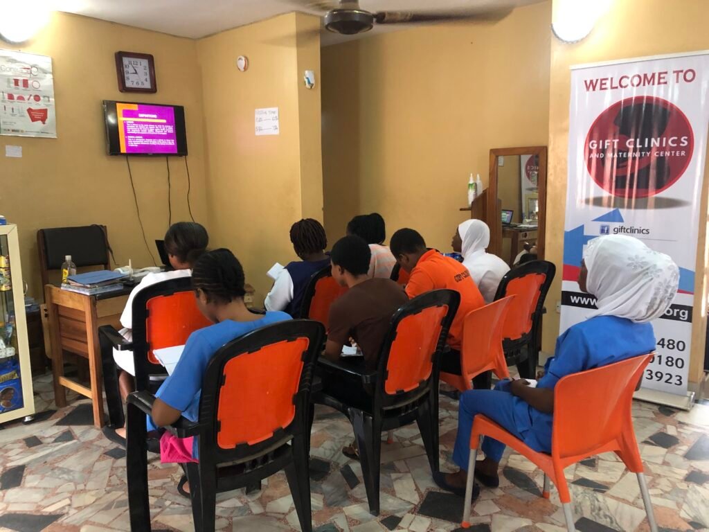gift clinic staff and trainee meeting picture